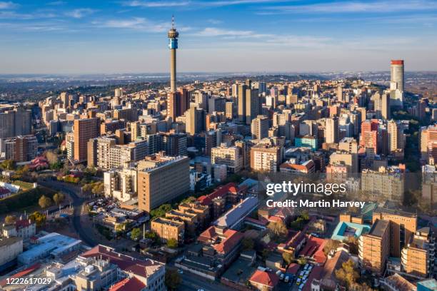 aerial view of the magnificent johannesburg city centre at sunrise - johannesburg city of gold stock pictures, royalty-free photos & images