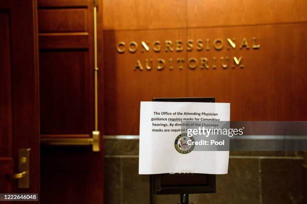 Sign advises that masks are required to enter a hearing of the U.S. House Judiciary Committee on at the Capitol Building June 24, 2020 in Washington,...