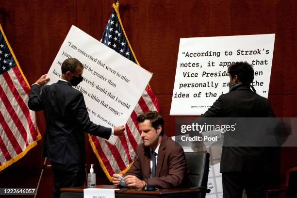 House staffers switch the display signs behind Rep. Matt Gaetz at a hearing of the House Judiciary Committee on at the Capitol Building June 24, 2020...