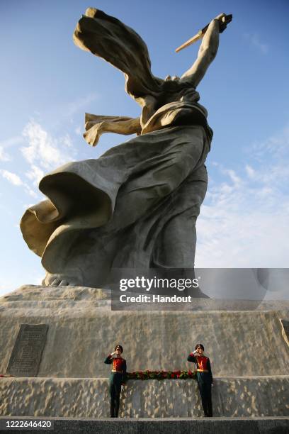 Guards of honor are seen here at the unveiling ceremony for The Motherland Calls monument, timed to coincide with the 75th anniversary of Victory in...
