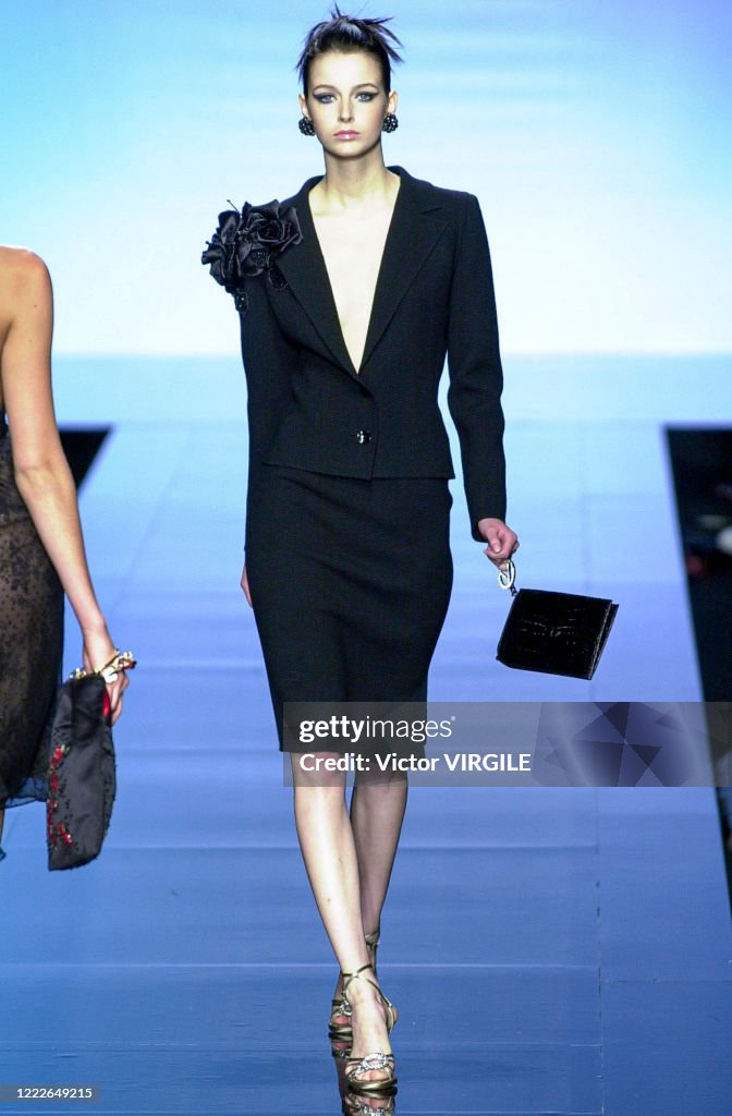 A model walks the runway during the Valentino Haute Couture... News