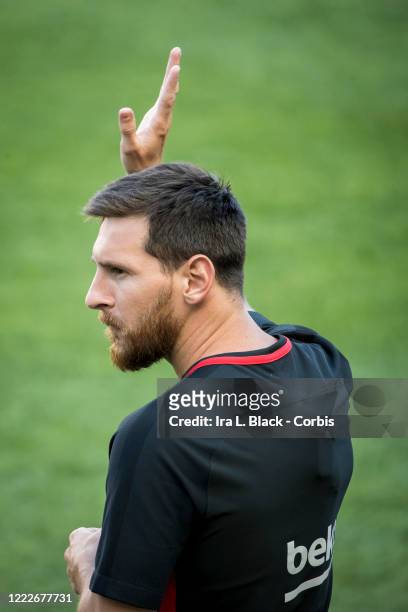 Lionel Messi of Barcelona waves to the crowd of fans at the International Champions Cup Barcelona training session. On April 8, 2020 rumors of a...