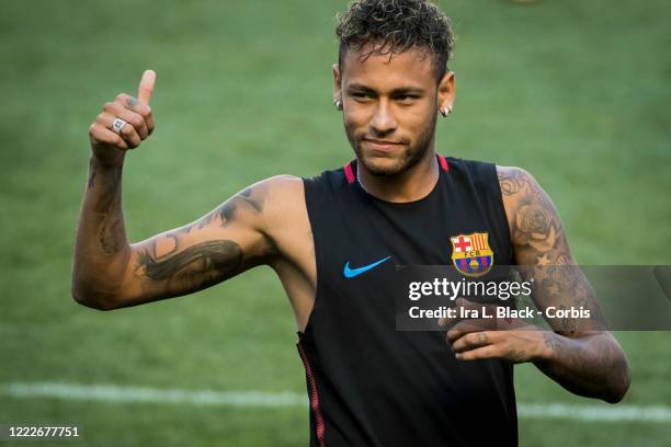 Neymar of Barcelona gives a thumbs up to fans at the International Champions Cup Barcelona training session. On April 8, 2020 rumors of a transfer...