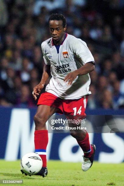 Sidney Govou of Olympique Lyonnais in action during the UEFA Champions League Group D match between Olympique Lyonnais and Manchester United at the...