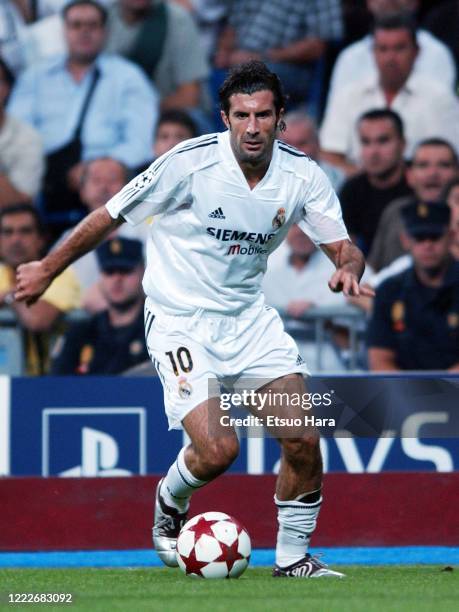 Luis Figo of Real Madrid in action during the UEFA Champions League Group B match between Real Madrid and AS Roma at the Estadio Santiago Bernabeu on...