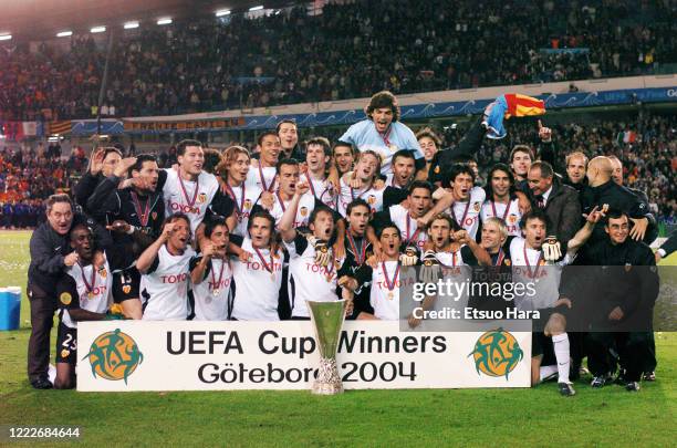 Valencia players and staffs celebrate after winning the UEFA Cup final between Valencia and Olympique Marseille at the Ullevi on May 19, 2004 in...