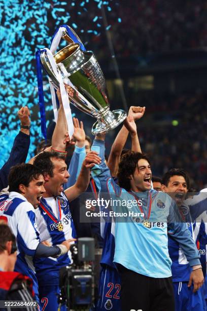 Vitor Baia of Porto lifts the trophy at the award ceremony following the UEFA Champions League final between AC Monaco and Porto at the Arena...