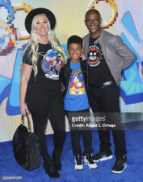 Tommy Davidson with wife Amanda Moore and son Isaiah Davidson attend the LA Special Screening Of Paramount's "Sonic The Hedgehog" held at Regency...