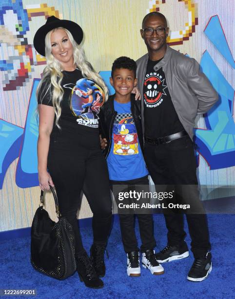 Tommy Davidson with wife Amanda Moore and son Isaiah Davidson attend the LA Special Screening Of Paramount's "Sonic The Hedgehog" held at Regency...