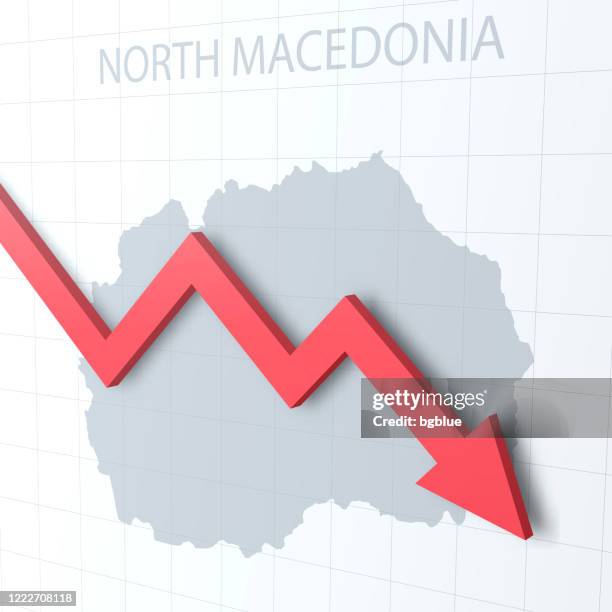 falling red arrow with the north macedonia map on the background - macedonia country stock illustrations