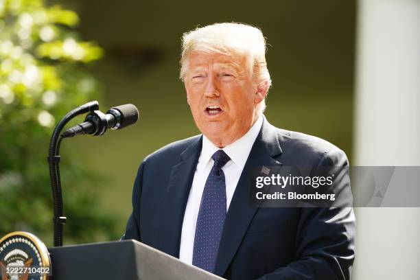 President Donald Trump speaks during a news conference with Andrzej Duda, Poland's president, not pictured, in the Rose Garden of the White House in...