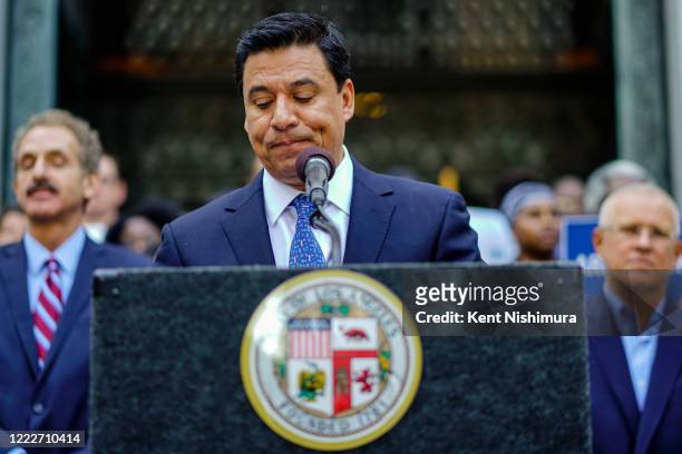 Los Angeles City Council member Jose Huizar, speakings a press conference with housing advocates in advance of the City Council's final vote on the...