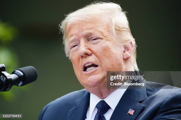 President Donald Trump speaks during a news conference with Andrzej Duda, Poland's president, not pictured, in the Rose Garden of the White House in...