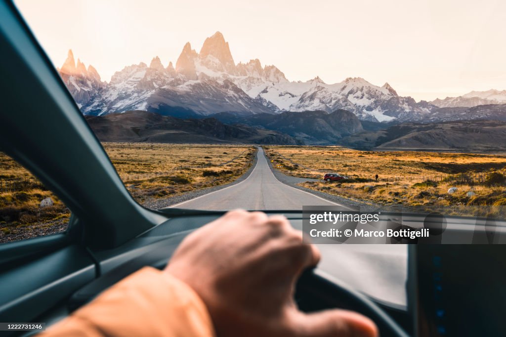 Personal perspective of man driving a car in Patagonia, Argentina