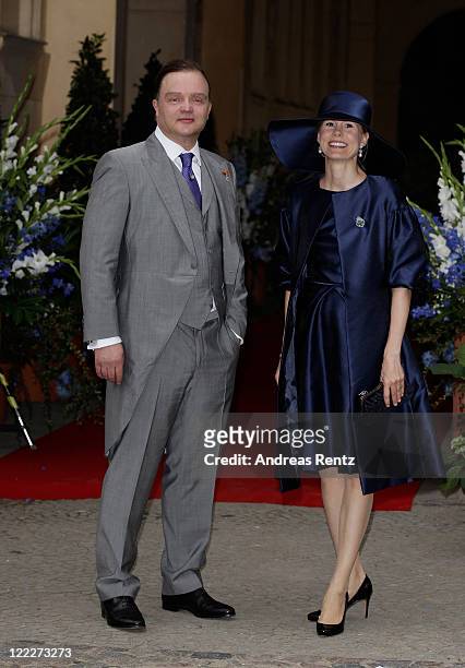 Alexander zu Schaumburg-Lippe and his wife Nadja attend the religious wedding ceremony of Georg Friedrich Ferdinand Prince of Prussia to Princess...