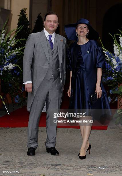 Alexander zu Schaumburg-Lippe and his wife Nadja attend the religious wedding ceremony of Georg Friedrich Ferdinand Prince of Prussia to Princess...