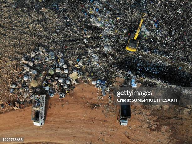 aerial view/waste pits, which are places to receive waste from the city to enter the disposal and sorting for recycling. - recycling center ストックフォトと画像