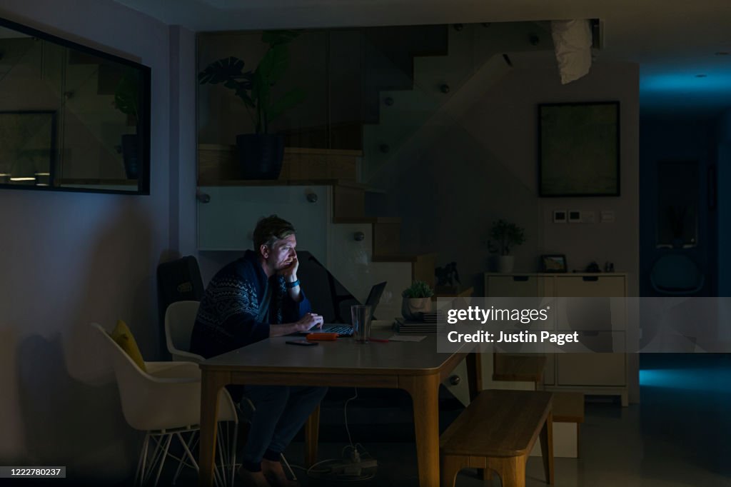 Man working from home late at night