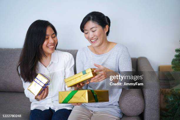 663 Asian Mom Receiving Gift Stock Photos, High-Res Pictures, and Images -  Getty Images