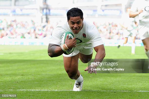 Manu Tuilagi of England scores the opening try during the International match between Ireland and England at the Aviva Stadium on August 27, 2011 in...