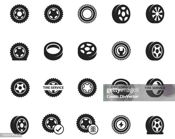 tire icon set - car tire glyph stock illustrations