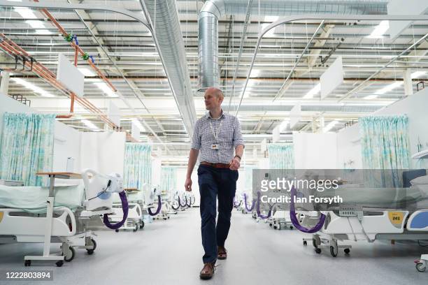 Dr Chris Johnson walks through ward 6 at the new NHS Nightingale North East hospital opened in response to the coronavirus pandemic on May 04, 2020...