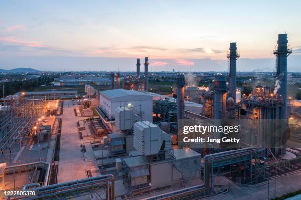 gas turbine electrical power plant during sunset and twilight time - gas turbine electrical power plant stock pictures, royalty-free photos & images
