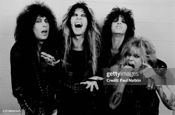 Portrait of members of American Heavy Metal group WASP as they pose backstage at the Riviera Theater, Chicago, Illinois, January 19, 1986. Pictured...