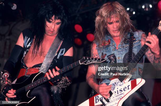 American Heavy Metal musicians Blackie Lawless and Chris Holmes, both of the group WASP, perform onstage at the Aragon Ballroom, Chicago, Illinois,...