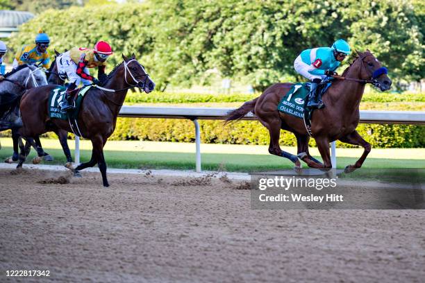 Jockey Martin Garcia rides Charlatan to the lead during the 84th running of The Arkansas Derby Grade 1 at Oaklawn Racing Casino Resort on Derby Day...