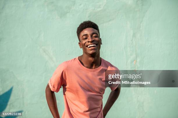 portrait of a young handsome african man. - joyful fashion model stock pictures, royalty-free photos & images