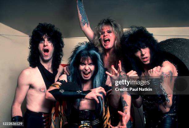 Portrait of members of the American Heavy Metal group WASP as they pose backstage at the Aragon Ballroom, Chicago, Illinois, February 9, 1985....