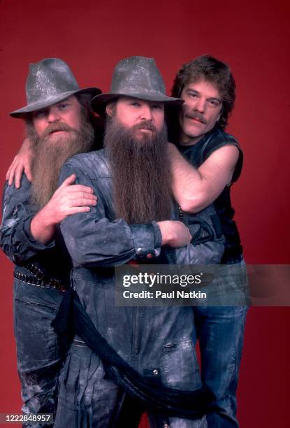 Portrait of members of the American Rock group ZZ Top as they pose backstage at the Metro Center, Rockford, Illinois, February 8, 1984. Pictured are,...