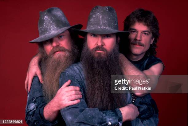 Portrait of members of the American Rock group ZZ Top as they pose backstage at the Metro Center, Rockford, Illinois, February 8, 1984. Pictured are,...