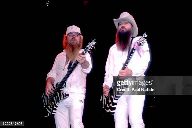 American Rock musicians Dusty Hill and Billy Gibbons, both of the group ZZ Top, perform onstage at the Metro Center, Rockford, Illinois, February 8,...