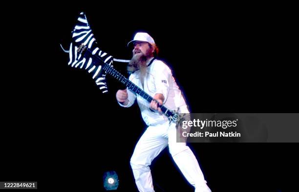 American Rock musician Dusty Hill, of the group ZZ Top, performs onstage at the Metro Center, Rockford, Illinois, February 8. 1984.