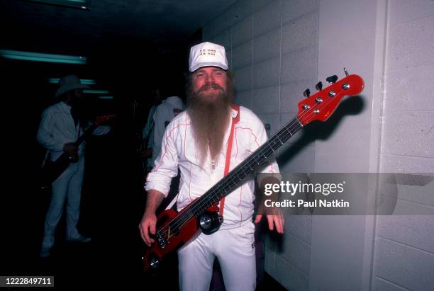 American Rock musician Dusty Hill, of the group ZZ Top, poses backstage at the Metro Center, Rockford, Illinois, February 8 1984.