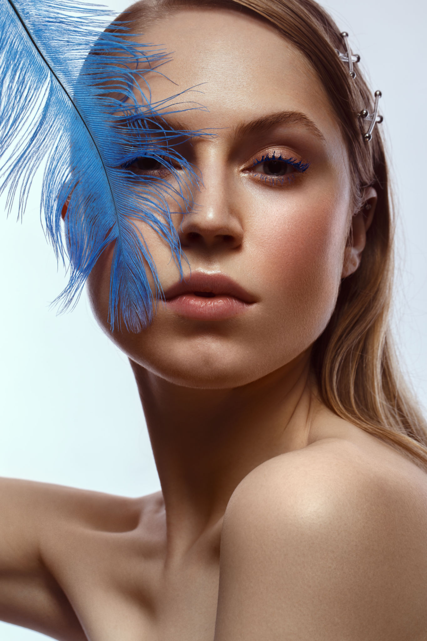 feathered brows