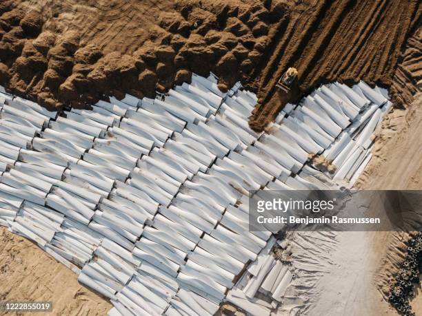 January 9, 2020: Pieces of wind turbine blades are buried in the Casper Regional Landfill in Casper, Wyoming. Around 8,000 wind turbine blades will...