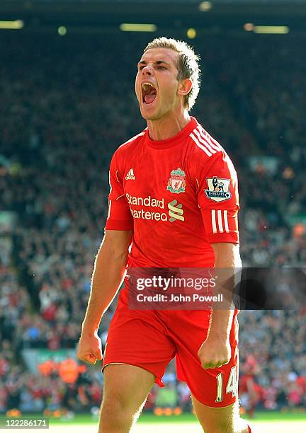 Jordan Henderson of Liverpool celebrates his goal to make it 1-0 during the Barclays Premier League game between Liverpool and Bolton Wanderers at...