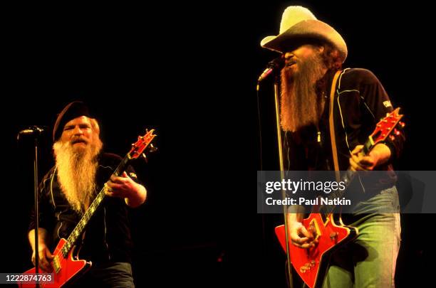 American Rock musicians Dusty Hill and Billy Gibbons, both of the group ZZ Top, perform onstage at the Poplar Creek Music Theater, Hoffman Estates,...