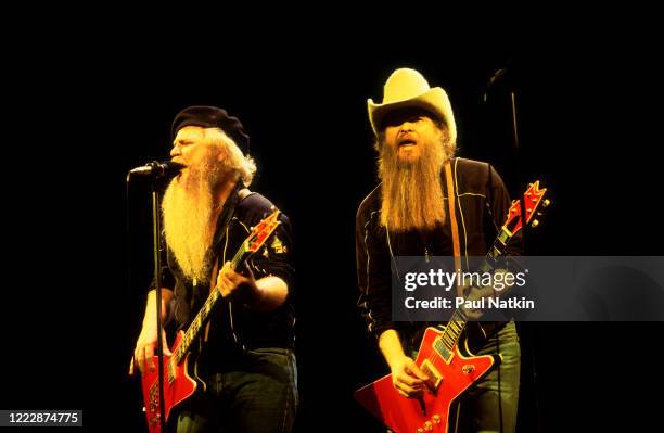 American Rock musicians Dusty Hill and Billy Gibbons, both of the group ZZ Top, perform onstage at the Poplar Creek Music Theater, Hoffman Estates,...