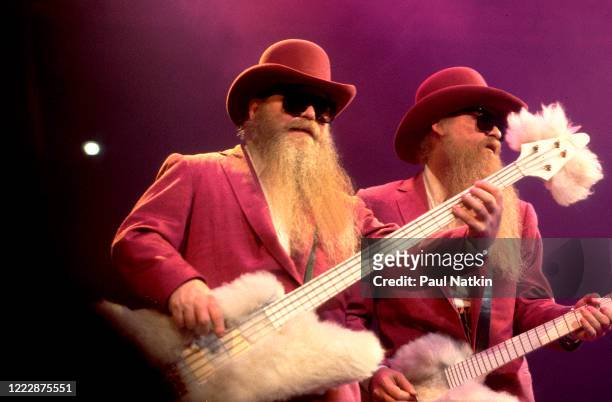 American Rock musicians Dusty Hill and Billy Gibbons, both of the group ZZ Top, perform onstage at the Bradley Center, Milwaukee, Wisconsin, October...