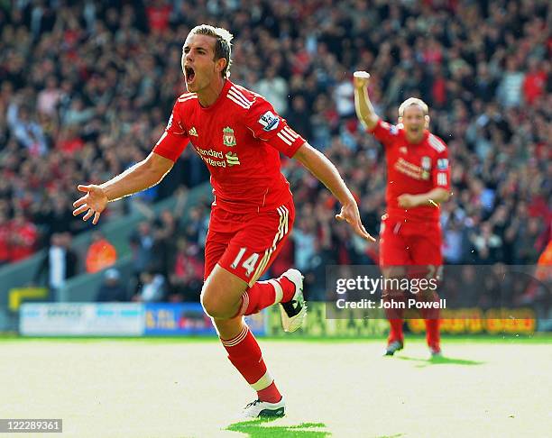 Jordan Henderson of Liverpool celebrates his goal to make it 1-0 during the Barclays Premier League game between Liverpool and Bolton Wanderers at...