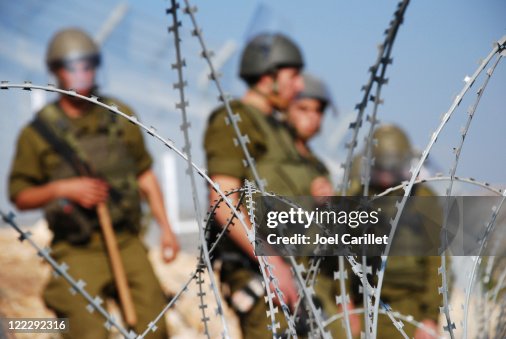Razor Wire and Soldiers Razor Wire and Soldiers