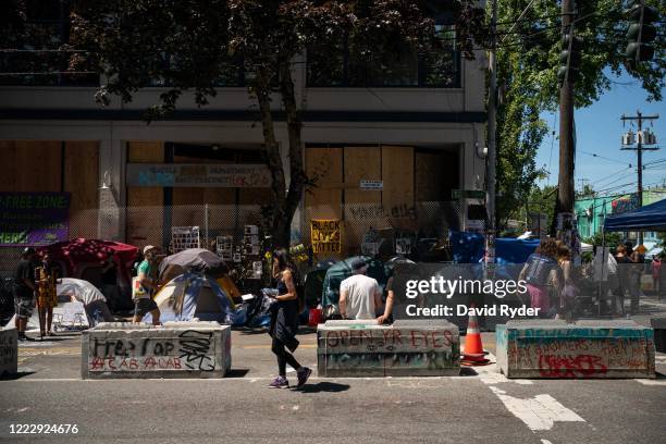 Tents sit outside of the Seattle Police Department's vacated East Precinct in the area known as the Capitol Hill Organized Protest on June 25, 2020...