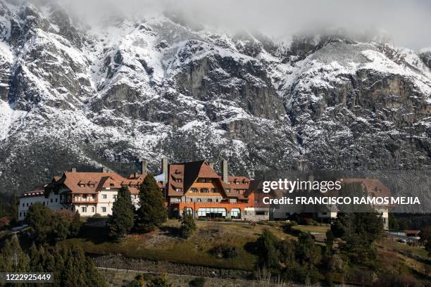 View of the Llao Llao hotel and the snow-covered Lopez hill in the background, during the lockdown imposed by the government against the spread of...