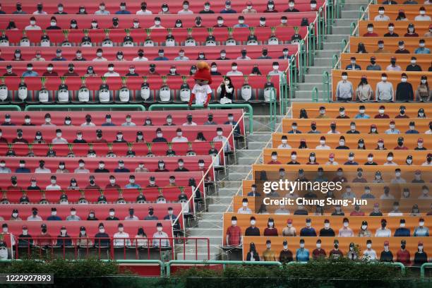 The stands at SK Wyverns club's Happy Dream Ballpark, are filled with placards featuring their fans during the Korean Baseball Organization League...