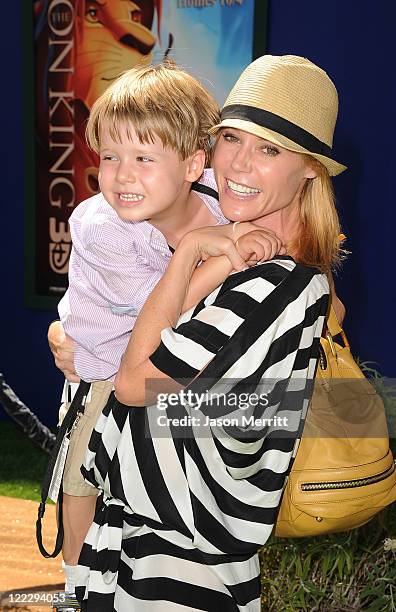 Actress Julie Bowen and her son Oliver McLanahan Phillips arrive at the premiere of Walt Disney Studios' "The Lion King 3D" on August 27, 2011 in Los...