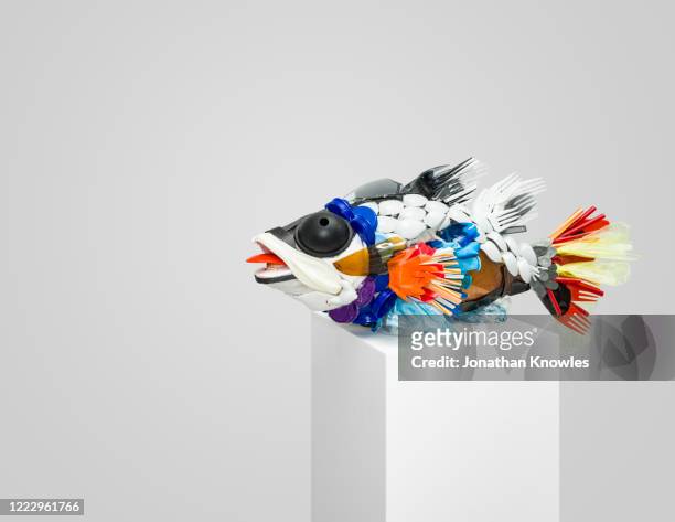 recycled plastic fish sculpture - animal sculpture stock pictures, royalty-free photos & images